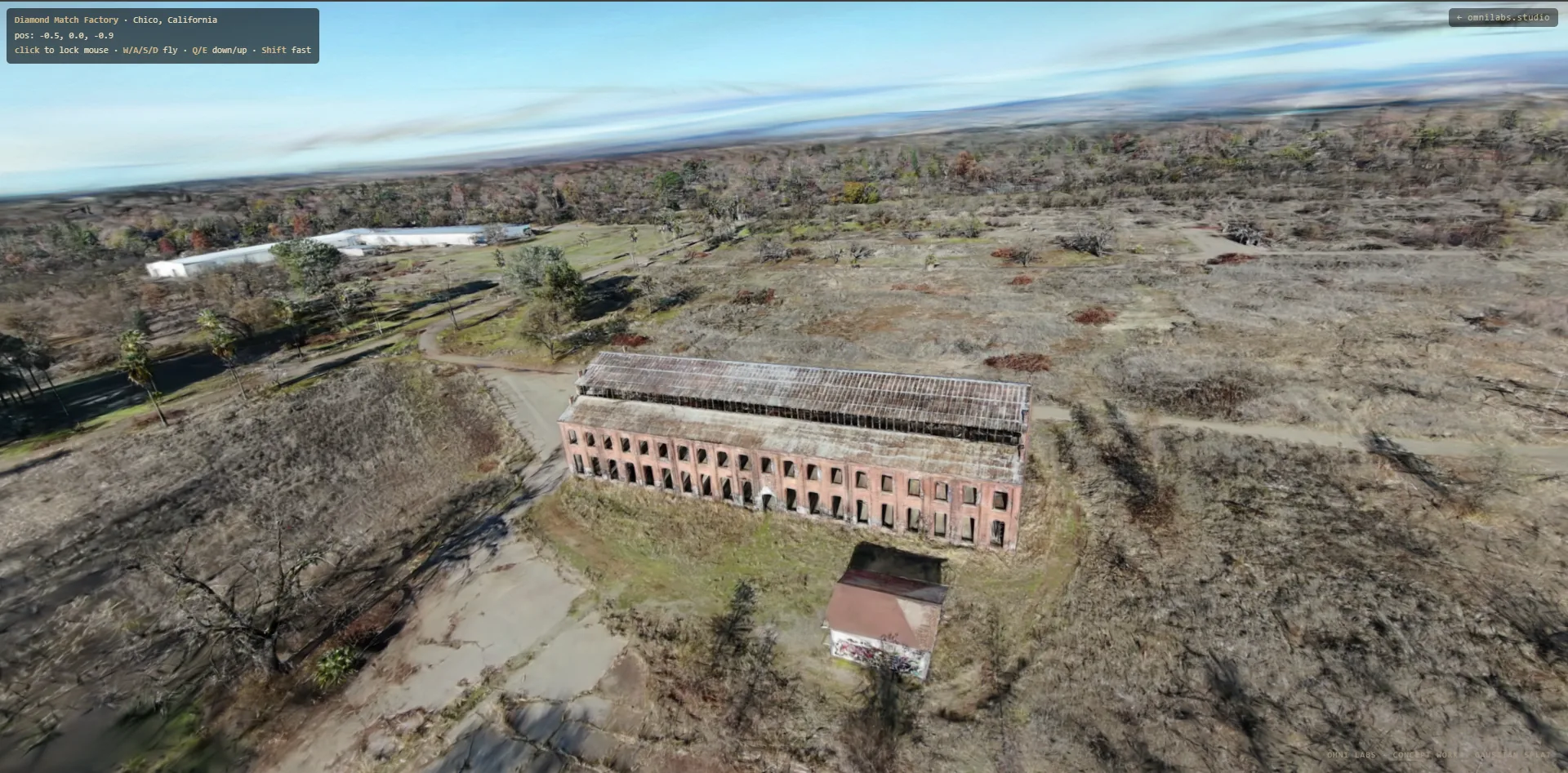 Diamond Match Factory — long brick façade, every window resolved in the splat